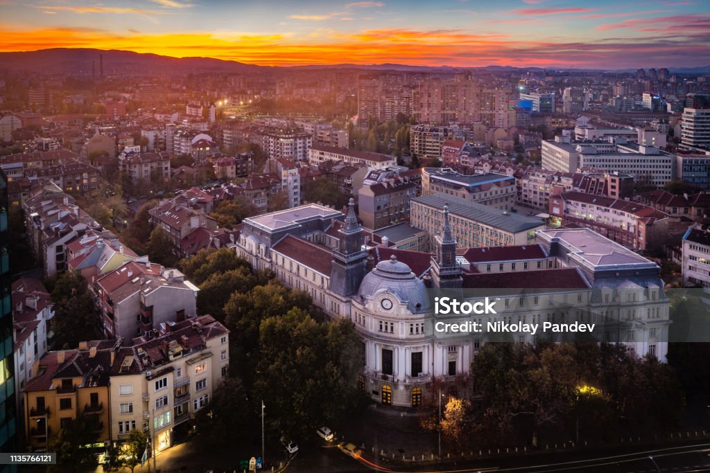 High angle view above city of Sofia, Bulgaria, Eastern Europe - stock image Panoramic high angle view above Western city of Sofia, Bulgaria, Eastern Europe during sunset back light into the sky. Shot on Canon EOS full frame system with tilt-shift prime lens. Bulgaria Stock Photo