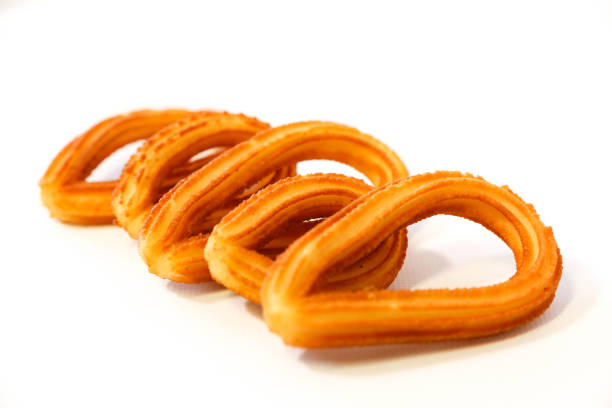 istock spanish fritters on white background 1135767439