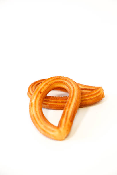 istock two spanish fritters on white background 1135767684