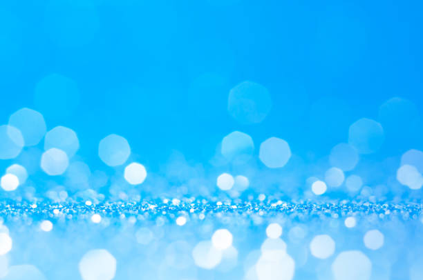 istock Blue and white bokeh,circle abstract light background,Blue shining lights,sparkling glittering Christmas lights.Blurred abstract elegance,smooth backdrop,artwork design for fathers day event. 1135767727