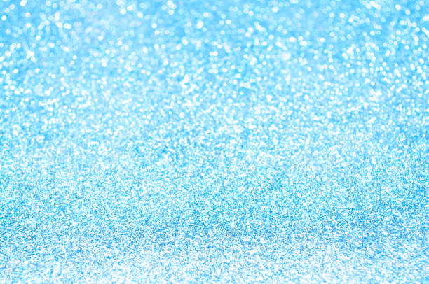 Blue,Silver white abstract light background, Blue shining lights, sparkling glittering Christmas lights. Blurred abstract elegance,smooth backdrop,artwork design for fathers day event background.