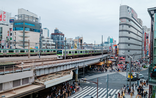 Tokyo, Japan - November 06 2016: A Train passing above the Ameyoko Shopping Street at Ueno
