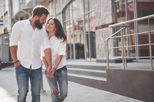 istock A young funny loving couple have fun on a sunny day. 1135771586