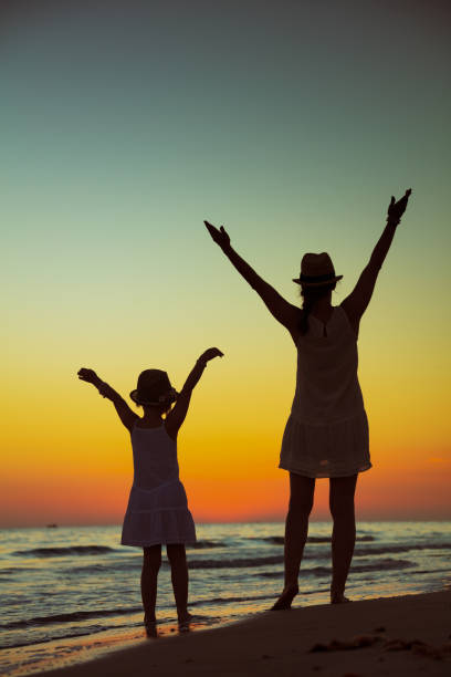 istock young mother and daughter travellers rejoicing 1135773336