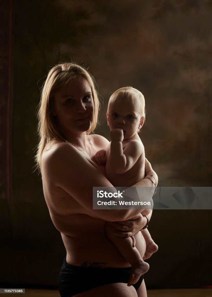 Mother And Child Semi Nude Embracing Stock Photo - Download Image Now -  12-17 Months, 12-23 Months, Adult - iStock