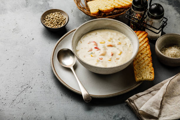 istock Chowder Crab Soup with shrimps and corn on concrete background copy space 1135775743