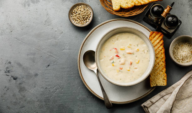istock Chowder Crab Soup with shrimps and corn on concrete background copy space 1135775792