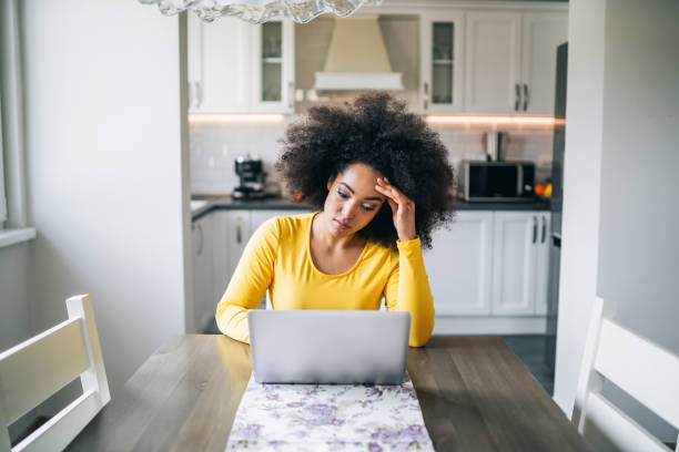 istock Depressed woman at home 1135776057