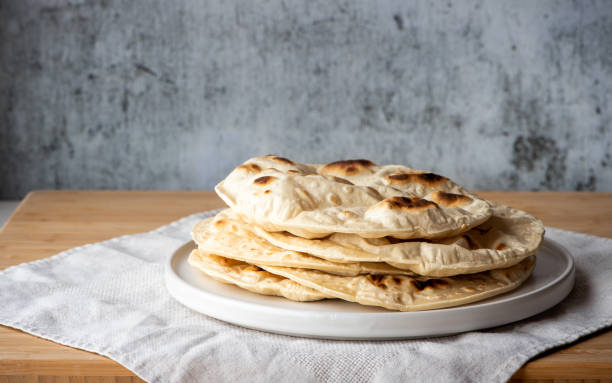 Traditional flat bread Traditional flat bread, naan bread. pita bread stock pictures, royalty-free photos & images