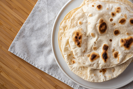 Traditional flat bread top view, naan bread.