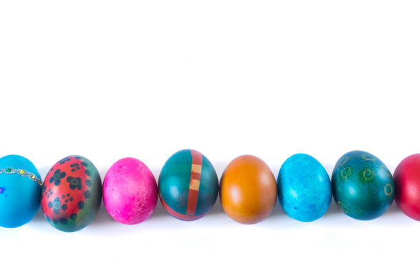 istock Colorful easter eggs isolated on white background with place for text 1135778230