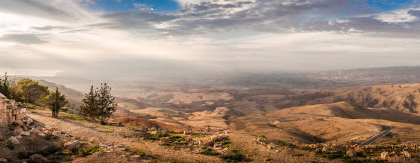 Panorama of the Holy Land from the Mount Nebo in Jordan, Middle East Panorama of the Holy Land from the Mount Nebo in Jordan, Middle East jordan middle east photos stock pictures, royalty-free photos & images