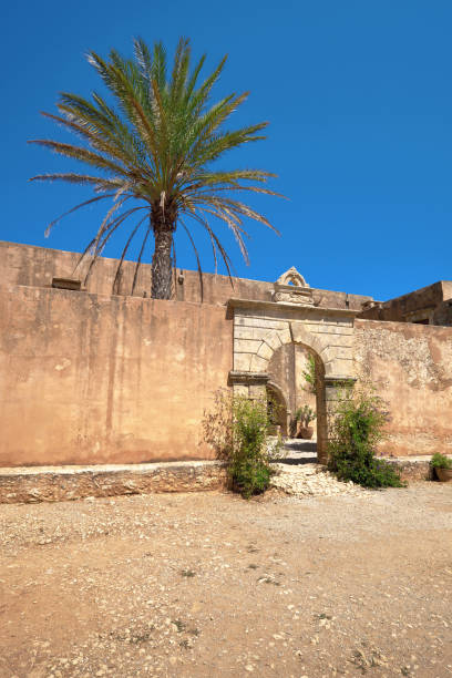 istock Arcadi monastery in Crete, arched entrance, copy-space 1135780735