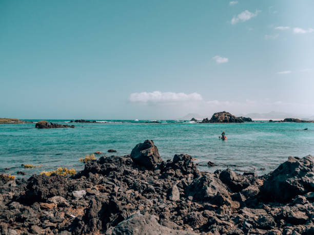 istock man doing snorkel in the sea 1135784106