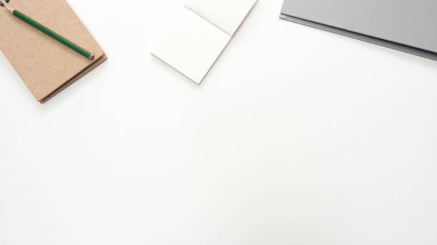istock Office desk table with  notebook and pencil  Top view copy space 1135784619