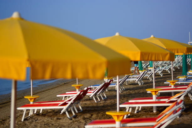 umbrellas and deckchairs are still free early in the morning a wonderful morning on the sea san remo italy photos stock pictures, royalty-free photos & images