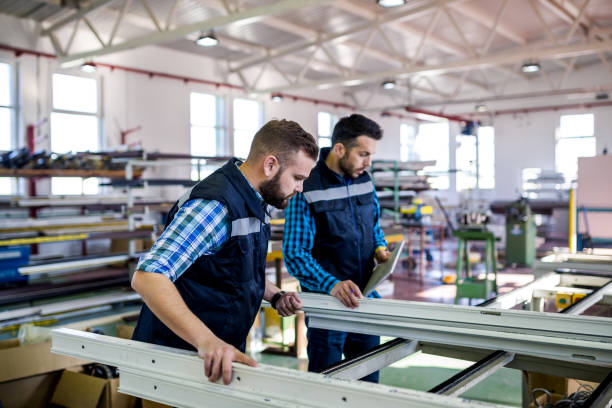 istock Aluminium and PVC industry workers 1135786134