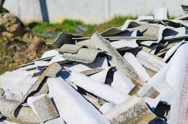 Photo of Broken asbestos roof, asbestos removal