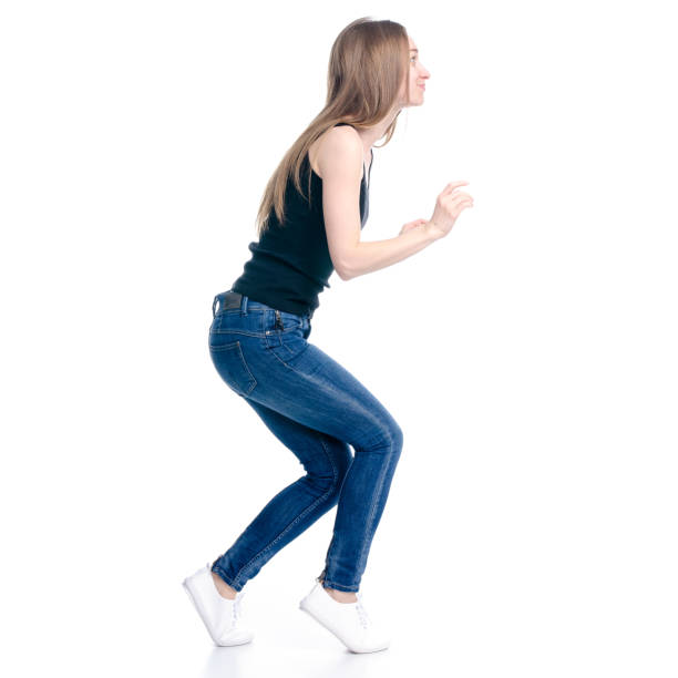 istock Woman in jeans sneaks sneak up 1135788847