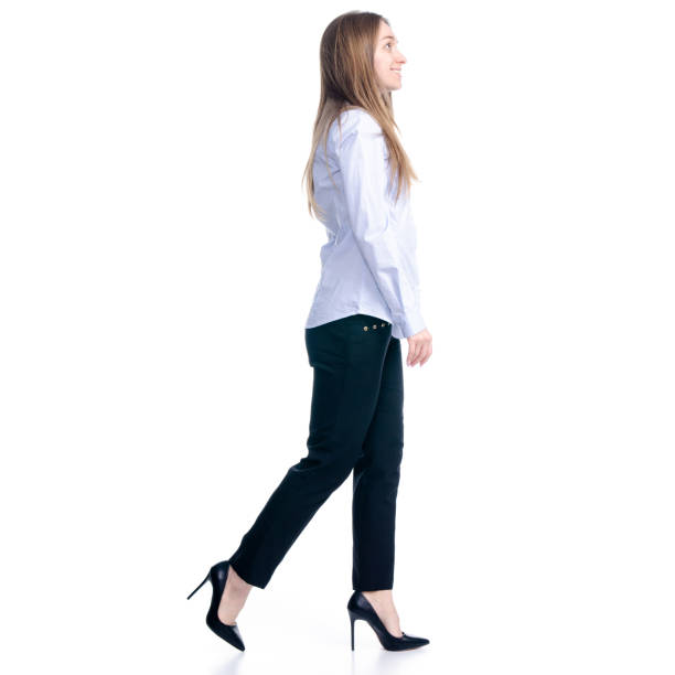 istock Buissness woman walking goes 1135788955