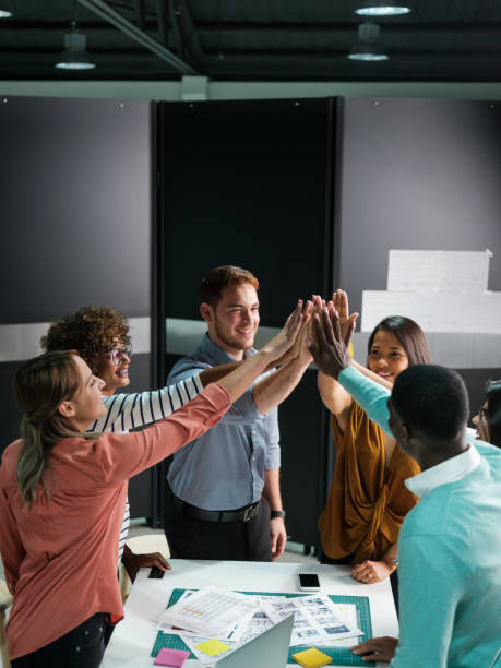 istock Business team celebrating 1135789051