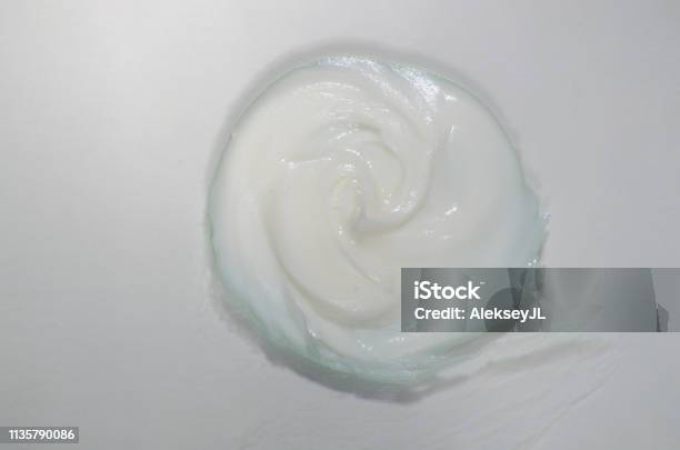 Cream On White A Sample Of Cosmetics Smear Cream For Face Stock Photo - Download Image Now
