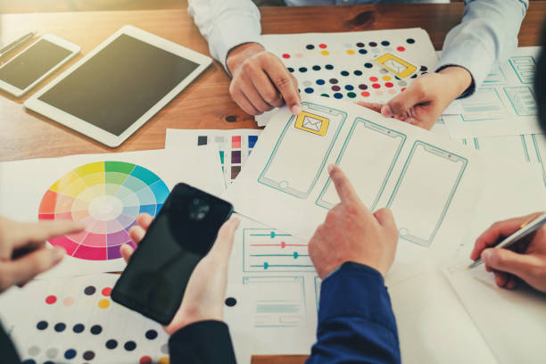 istock Young man designers planning work together on website ux app development. 1135790262
