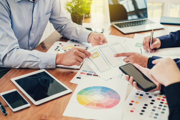 istock Young man designers planning work together on website ux app development. 1135790345