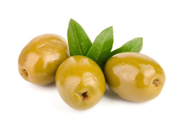 istock Green olives with leaves isolated on a white background 1135792000