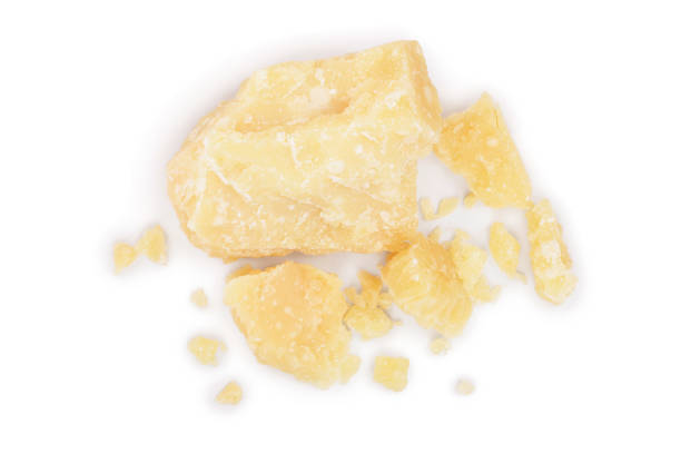 istock Parmesan cheese pieces isolated on white background. Closeup. Top view. Flat lay 1135792039
