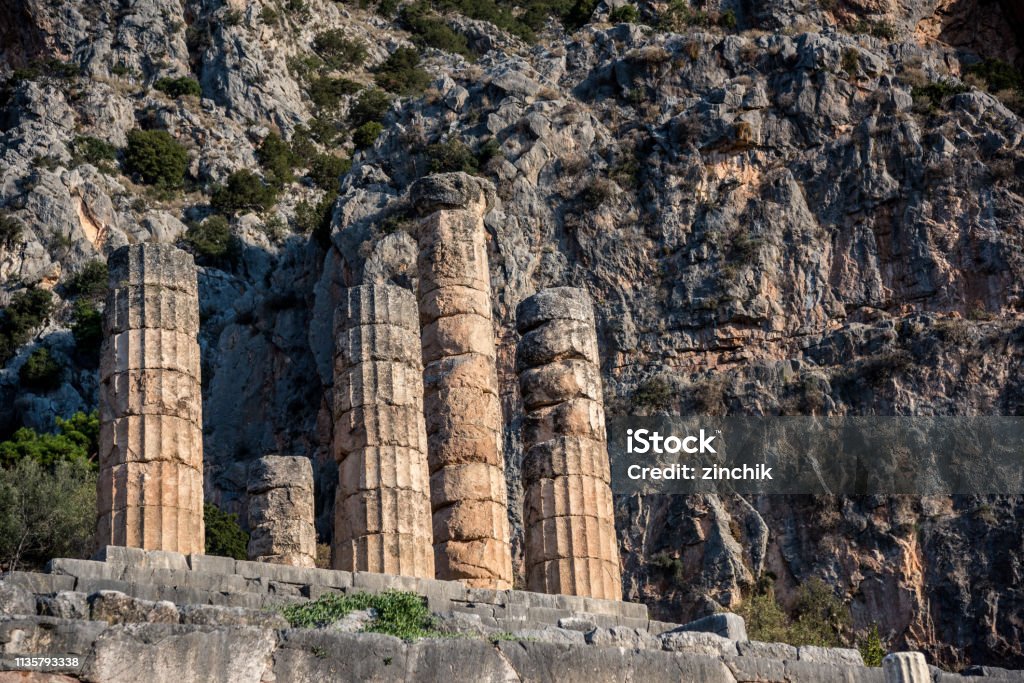 Temple of Apollo and Altar of Chiots in Delphi, Greece Altar of Chiots and Temple of Apollo in archaeological site of Delphi, Greece Altar Stock Photo