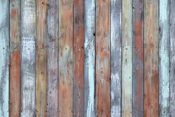 istock Wooden wall texture, old painted multicolored wood boards 1135794672