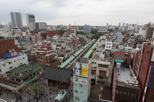 General view of Senso-ji Temple and Nakamise shopping street in Tokyo, Japan. Nakamise shopping street is the walkway shopping road to Senso-ji Temple.