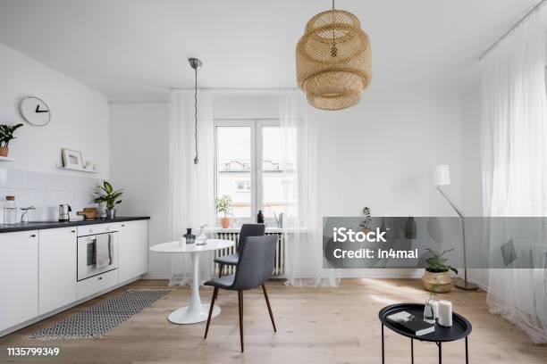 Spacious Kitchen Interior With Table Stock Photo - Download Image Now - Kitchen, Rug, Bamboo - Material