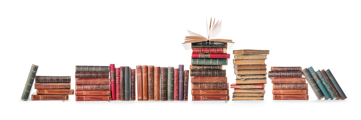 Long old books row isolated on white, clipping path included