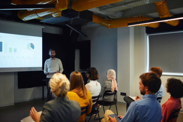 istock Business people on presentation 1135801765