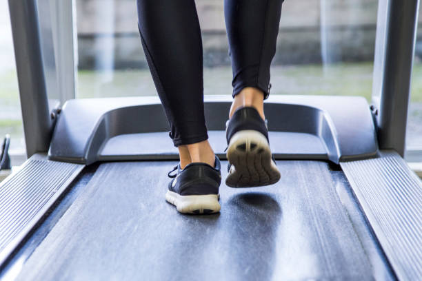 istock Girl training in the Gym with a treadmill 1135816374