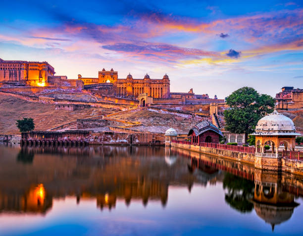 Amber Fort and Maota Lake, Jaipur, Rajasthan, India Amber Fort and Maota Lake at sunset.  Jaipur, Rajasthan, India, Asia rajasthan photos stock pictures, royalty-free photos & images