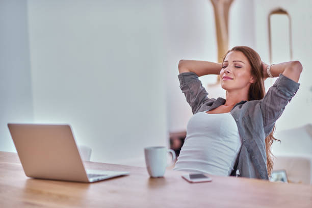 istock Young woman with digital tablet at home 1135820651