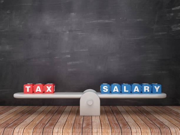 istock Seesaw Scale with TAX SALARY Cubes on Chalkboard Background - 3D Rendering 1135820735