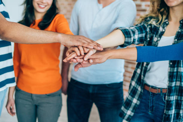 istock Group of friends showing unity 1135821536