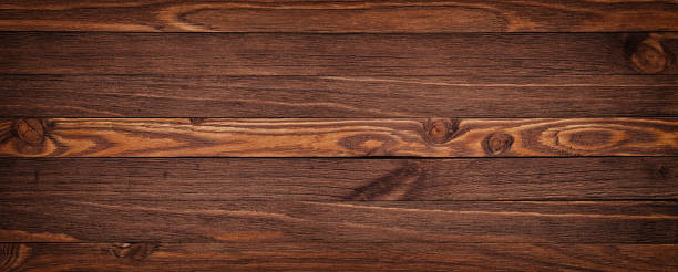 istock Grunge rich wood grain texture background with knots 1135822928