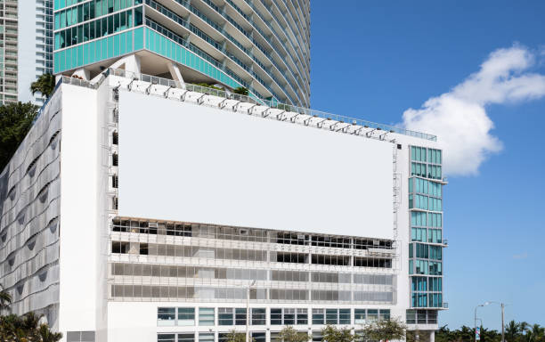 Empty white Billboard for presentation your design, Retail, advertising and commerce concept. Urban outdoor mockup.