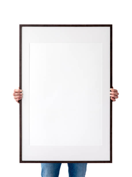 istock Holding frame mockup. Photo Mockup. The man hold frame. For frames and posters design. Frame size 24x36 (61x91cm). 1135826742