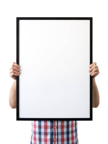 istock Holding frame mockup. Photo Mockup. The man hold frame. For frames and posters design. Frame size 20x28 (50x70cm). 1135826766