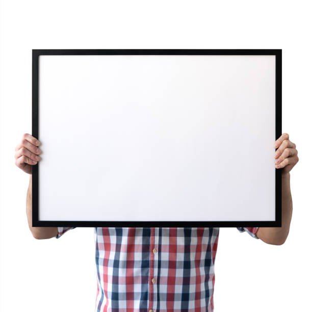 istock Holding frame mockup. Photo Mockup. The man hold frame. For frames and posters design. Frame size 28x20 (70x50cm). 1135826795