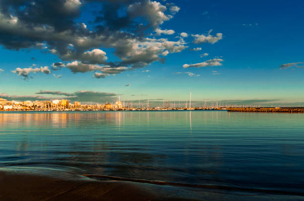 Beach and Yacht club at evening stock photo
