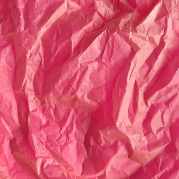 istock Crumpled Pink Paper Texture Background 1135828243