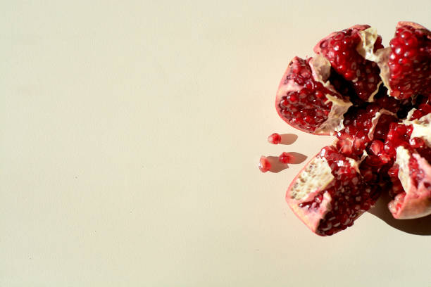 istock Ripe red juicy pomegranate. Grains pomegranate fruit. 1135830746