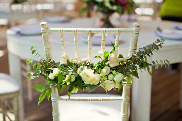 istock chairs with flowers and eucalyptus 1135831919
